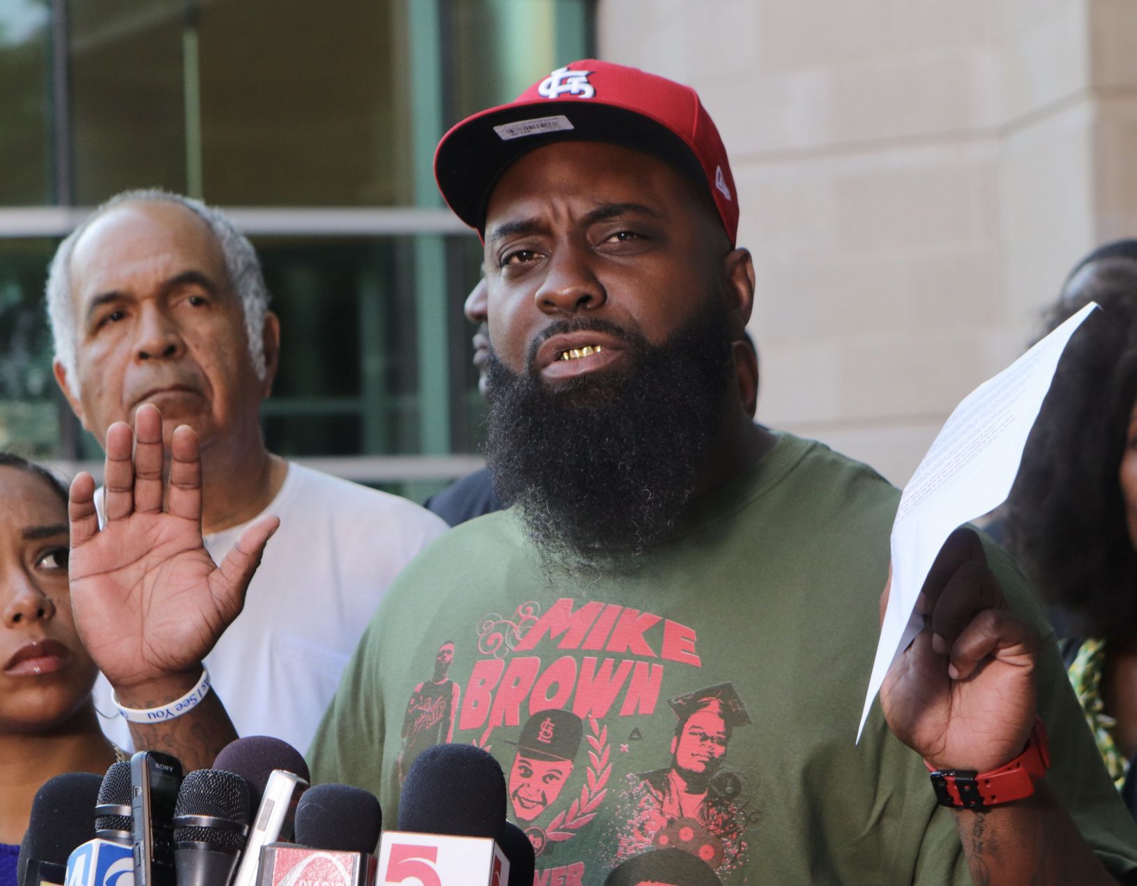 Michael Brown Sr. speaks to the press